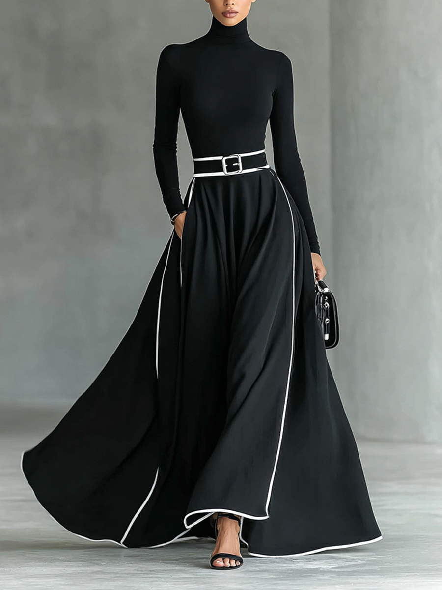 Renata – Vestido Maxi Negro con Costuras Blancas, Cuello Alto, Manga Larga y Cintura Ceñida