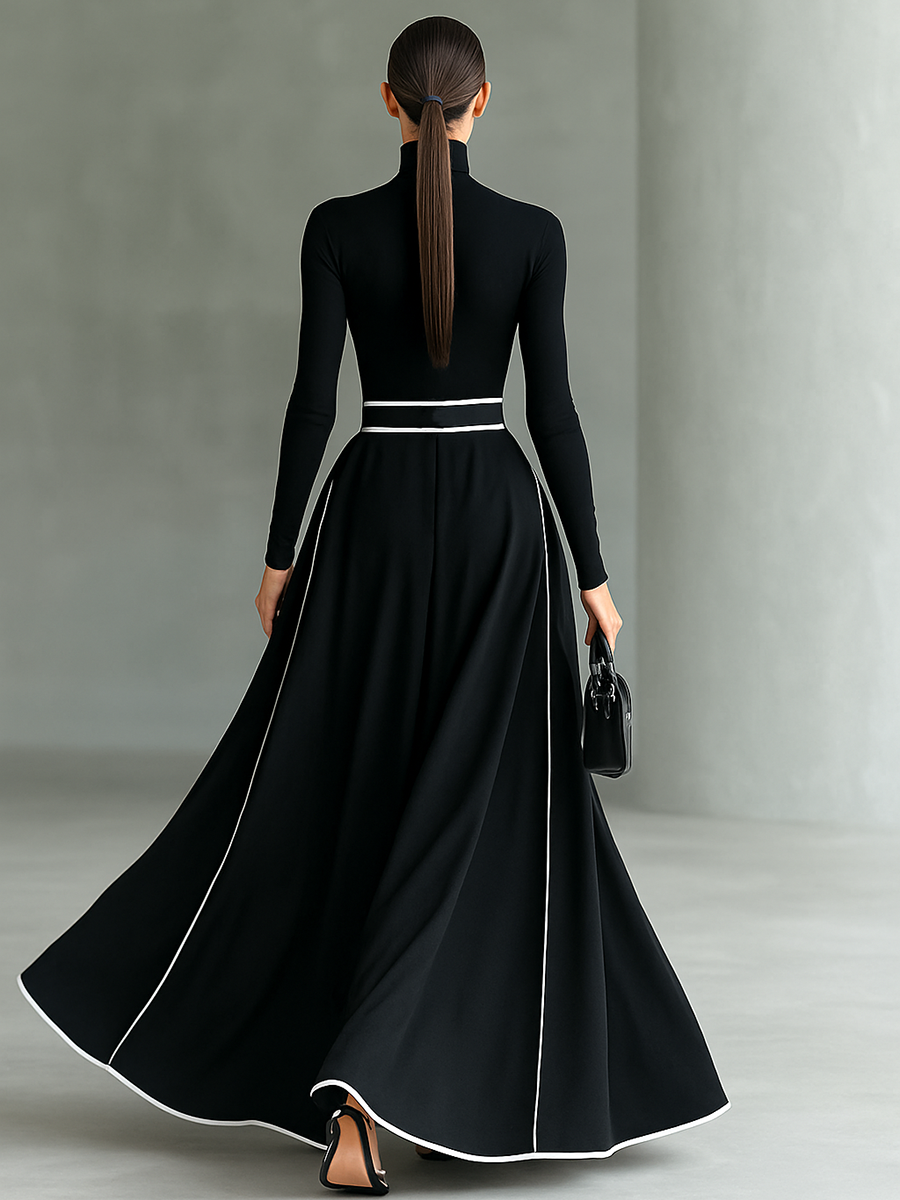 Renata – Vestido Maxi Negro con Costuras Blancas, Cuello Alto, Manga Larga y Cintura Ceñida